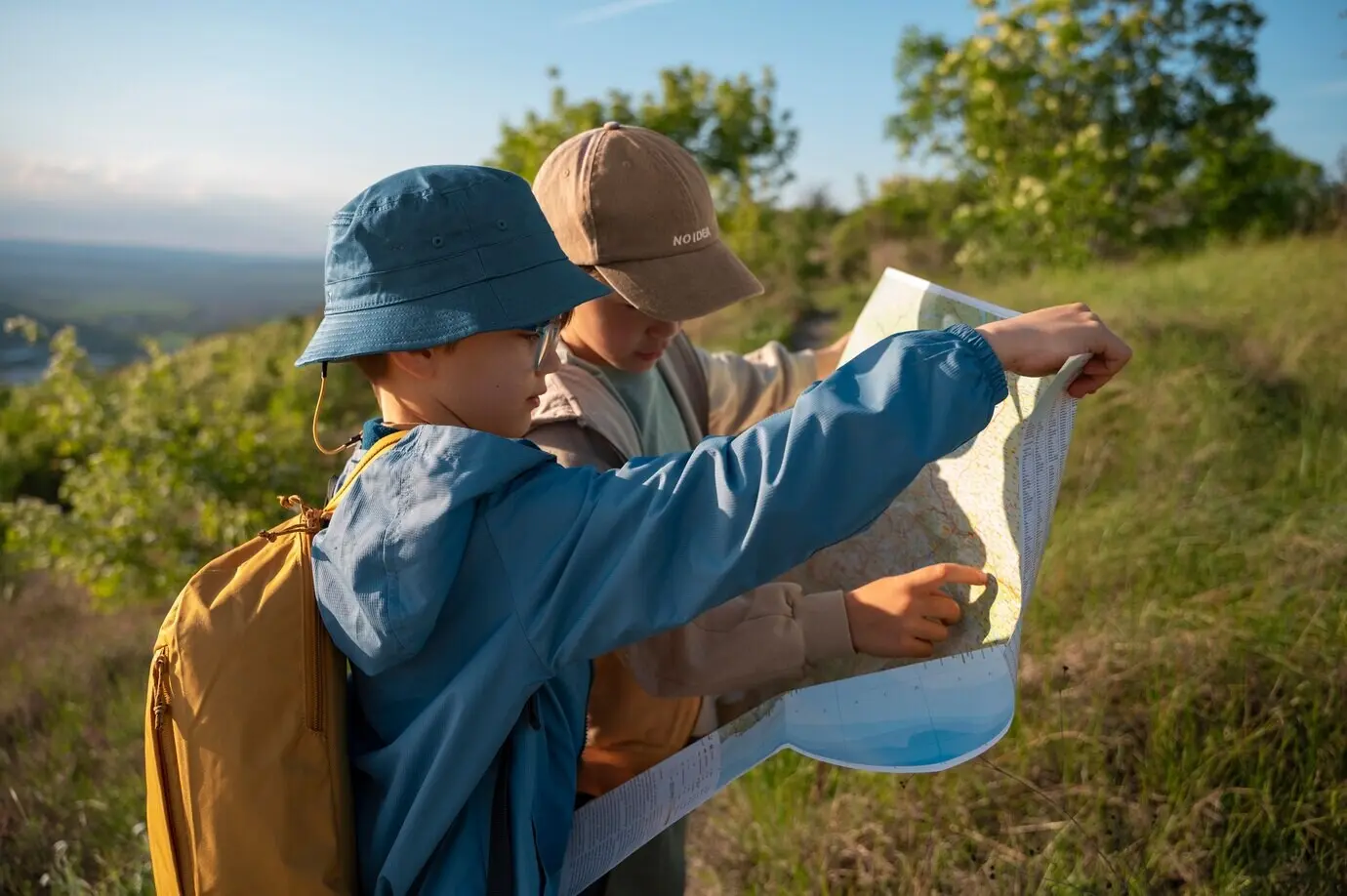 Medium shot of kids exploring a natural environment